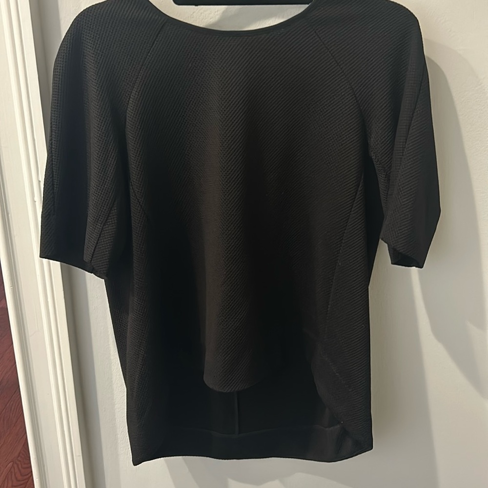 Oversized black pique pullover,  elbow length sleeves, back slightly longer